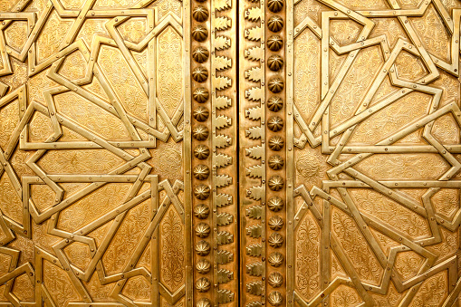 Fez, Morocco-September 22, 2013: Close-up details of Islamic patterns on the Haj Gate in Fez.