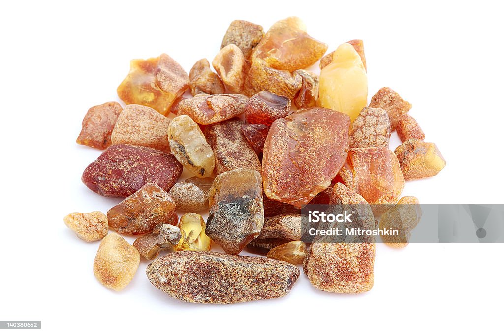 heap of amber heap of opaque amber on white background Amber Stock Photo