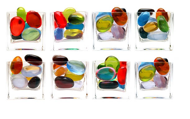 istock eight differents glass with colorful pebbled 140380688