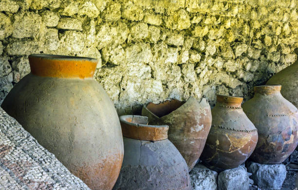 istock Ancient clay pots excavations into Greek city ruins 1403807544
