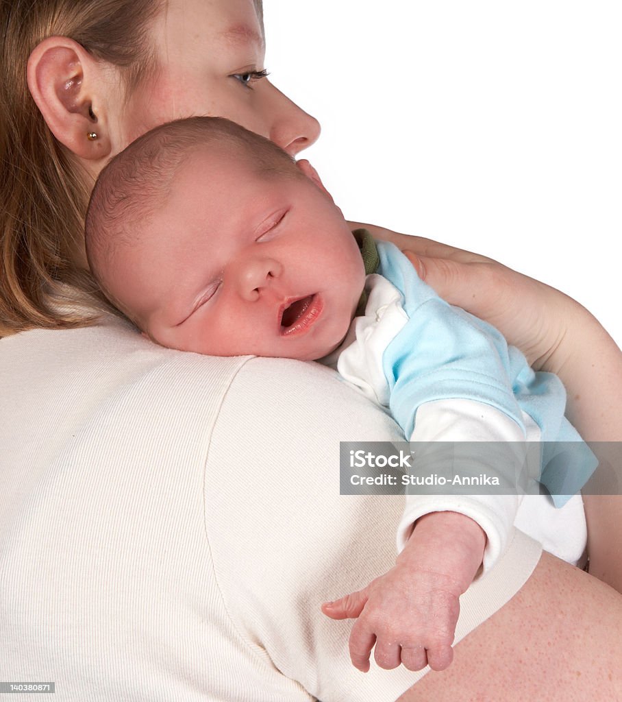 Asleep 15 days old little baby asleep in his mother's arms Baby - Human Age Stock Photo