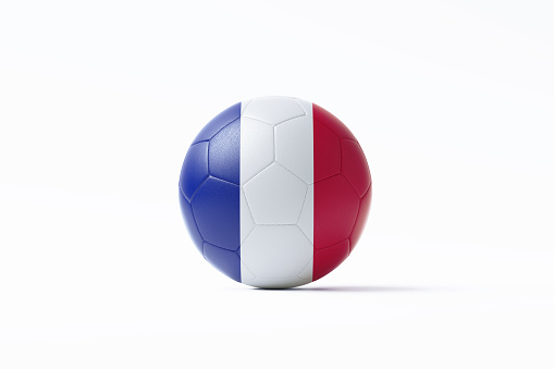 Soccer ball textured with French flag sitting on white background. Horizontal composition with copy space. Clipping path is included. Qatar 2022 World Cup qualifiers concept.