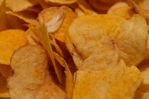Macro takes a picture of potato chips.