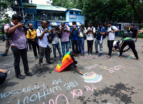 Kolkata,west Bengal,India 06.19.2022. LGBT family people celebrate the official pride month  in the morning with write their message in the street of the city of Kolkata. The photographers of different medias captured it.