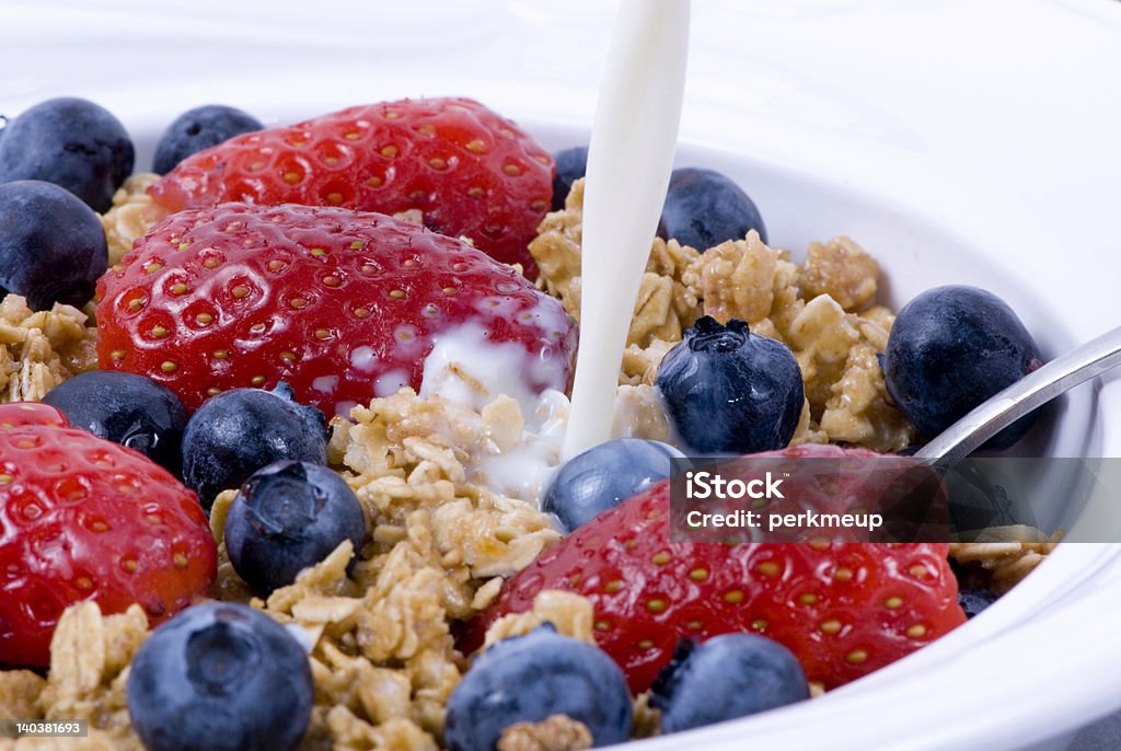 Breakfast Cereal 2 A good start to any day. Fresh fruits and cereal Almond Stock Photo