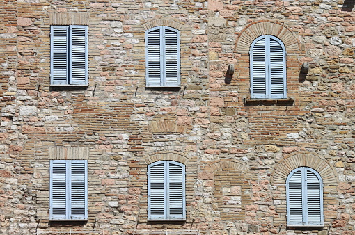 Italian style shutters in a old medieval palace
