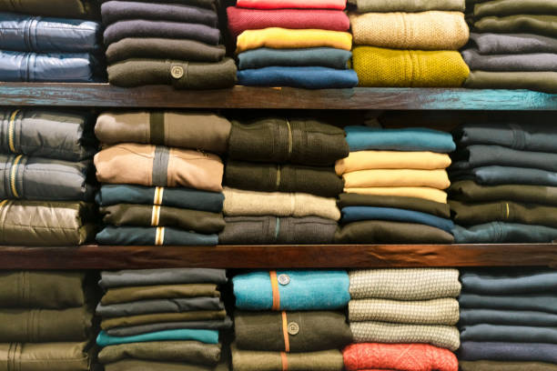 istock Warm clothing arranged in rack 1403818937