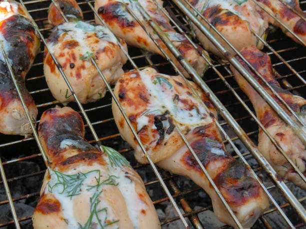 istock Grilled chicken meat fried on coals 1403819134