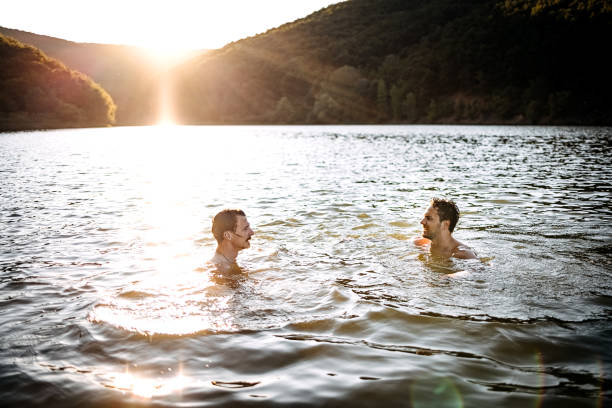 istock Friends are enjoying the lake 1403822025