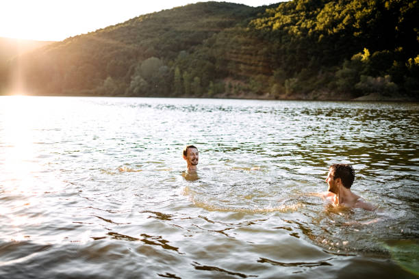 istock Friends are enjoying the lake 1403822029