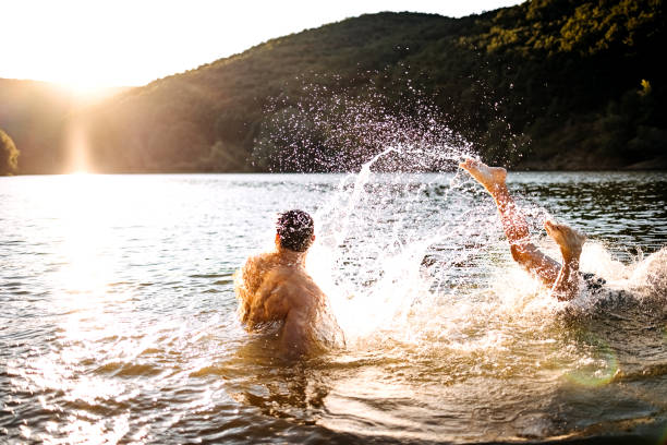 istock Friends are enjoying the lake 1403822108