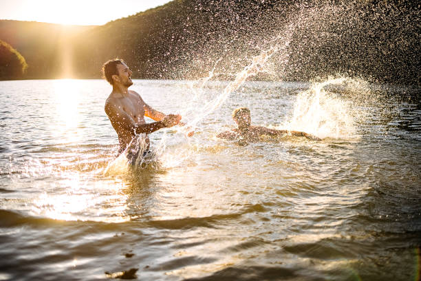 istock Friends are enjoying the lake 1403822244