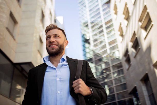 istock Businessman on his way to work carrying laptop bag 1403823523