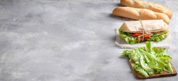 istock Banh mi sandwiches stuffed with various vegetables and meat. With copy space 1403823973