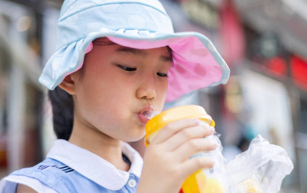 istock Little Girl Drinking 1403824791