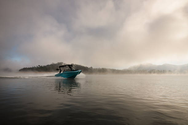 istock charming view of bright blue motorboat quickly floating on the water 1403826083