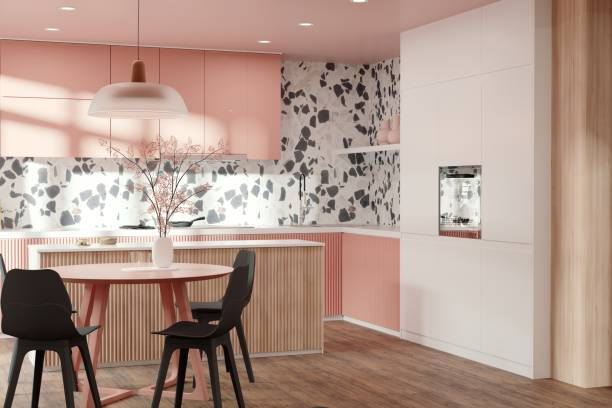 istock Kitchen interior design in modern style with terazzo wall and pink cabinets 1403826775