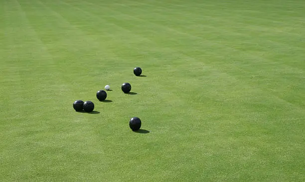 lawn bowling balls on field