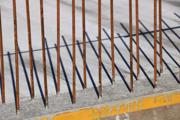 Bars made of mild steel cast shadows on a concrete surface Bars made of mild steel cast shadows on a concrete surface structural steel stock pictures, royalty-free photos & images