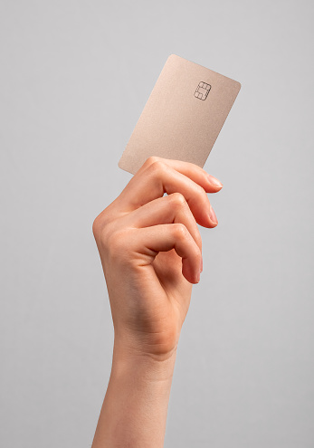 Maqueta de tarjeta de crédito con chip. Comprar en tiendas, realizar transacciones en terminales. Pagos seguros photo