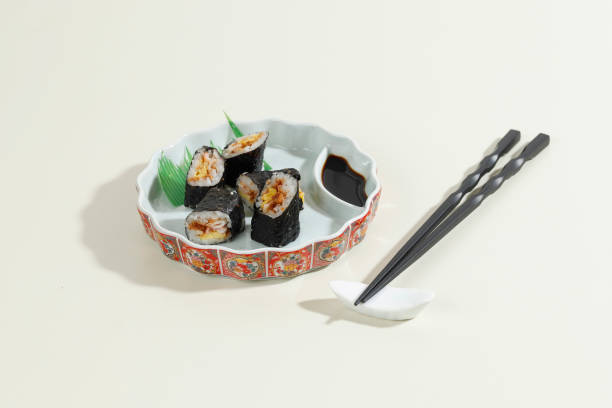 japanese food mini maki sushi platter on cream table served with wasabi and soy sauce. - main course salmon meal course imagens e fotografias de stock