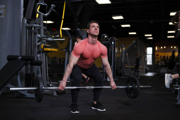 istock Ripped male bodybuilder training at gym 1403832848