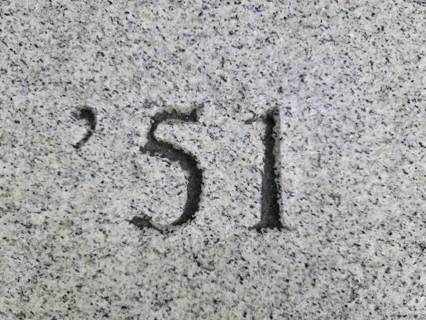istock the number 51 or year engraved or etched on marble 1403834132