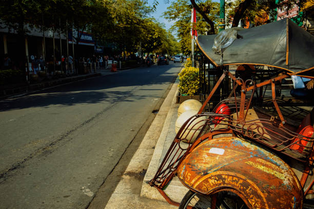 Malioboro Street Yogyakarta, Indonesia, May 2022 - The atmosphere of Malioboro street during the day no rickshaws sign stock pictures, royalty-free photos & images