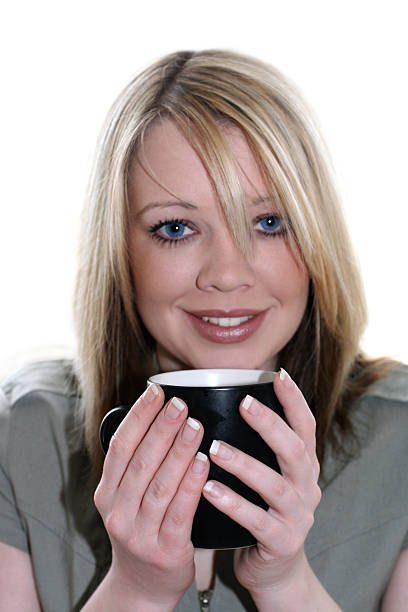 Woman drinking stock photo