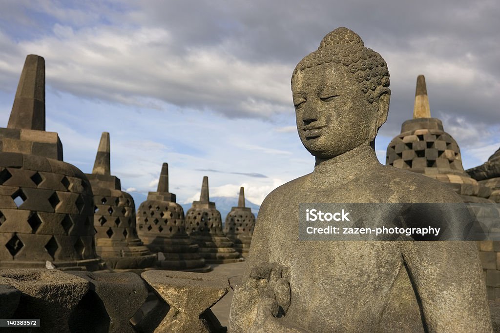 Borobudha2 Statue of the Buddha at Borobudur on Java in Indonesia. Asia Stock Photo