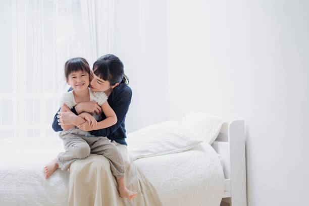 istock Mother playing with her child at home 1403835754