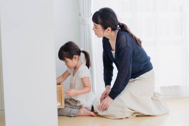 istock Mother playing with her child at home 1403835768