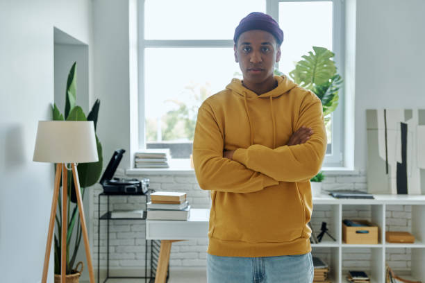 istock Handsome multiracial man keeping arms crossed 1403839043