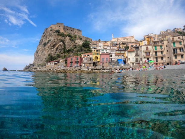 The sea and the color in a mediterranean beach under a castle (Scilla south Italy Calabria) The sea and the color in a Mediterranean beach under a castle (Scilla south Italy Calabria) castle scilla stock pictures, royalty-free photos & images