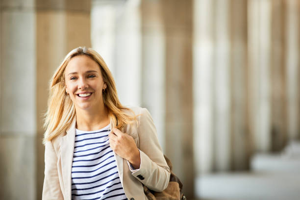 istock A cheerful law student is smiling at the camera. 1403844061