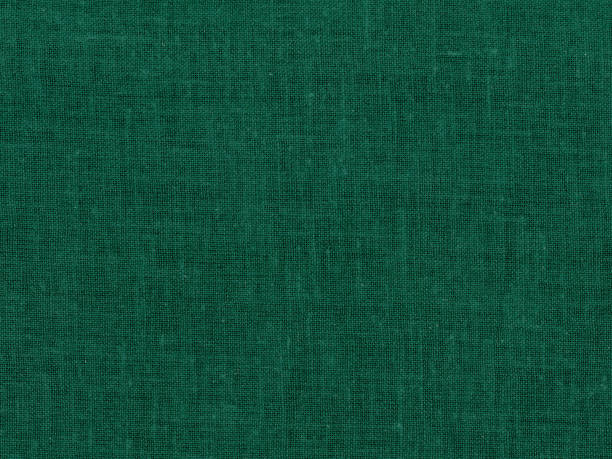 istock dark green cotton fabric texture background 1403845624