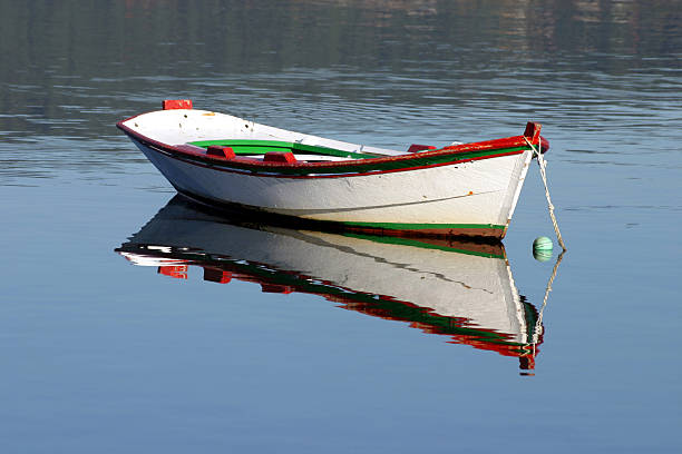 istock Reflection of a boat in lake 140384808