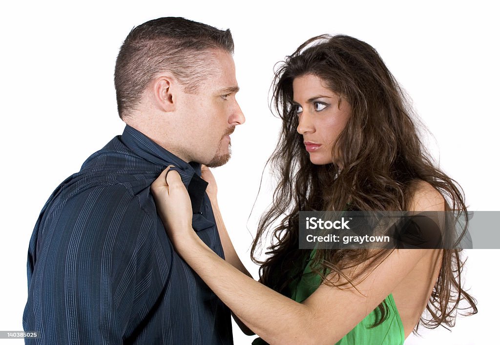 Fighting couple A couple in the middle of a physical fight Adult Stock Photo