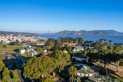 Aerial view of Fort Mason looking over the park and marina with the Golden Gate Bridge in the distance.