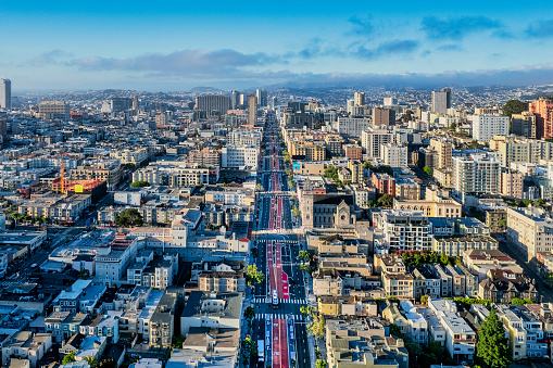 An aerial view of Van Ness in San Francisco. Looking down the bus line on a sunny morning.