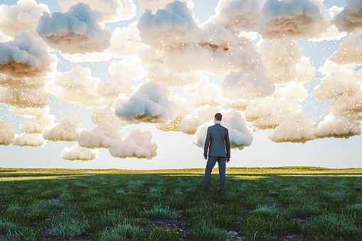 Surreal image of businessman standing in meadow. This is entirely 3D generated image.