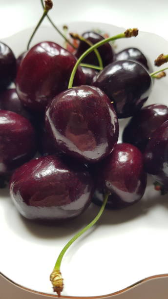 istock Close up of dark red cherries 1403851481