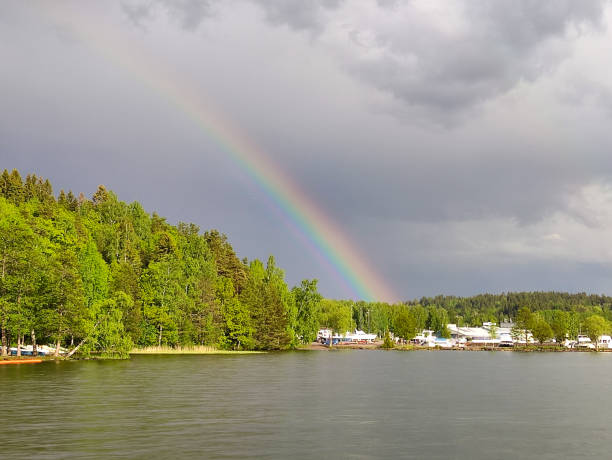 The city of Lahti, Finland, on the shores of Lake Vesijärvi. Rainbow on the city