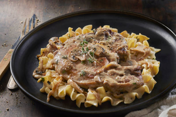 istock Braised Pork Chops in Creamy Mushroom Sauce 1403855769