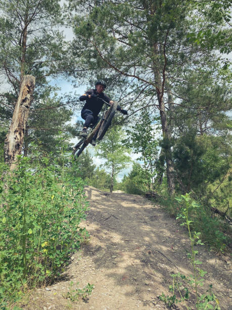 istock mountain bike jump 1403856720