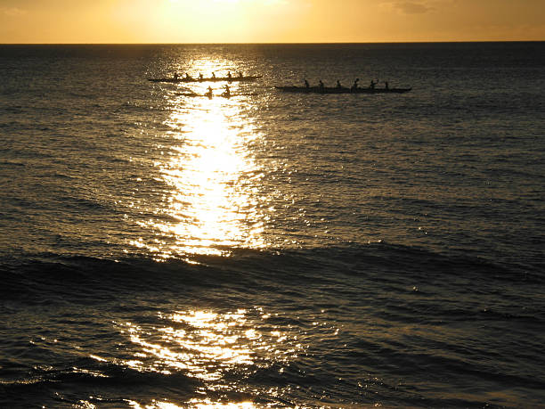 istock Hawaiian Outrigger canoes at sunset 140385929