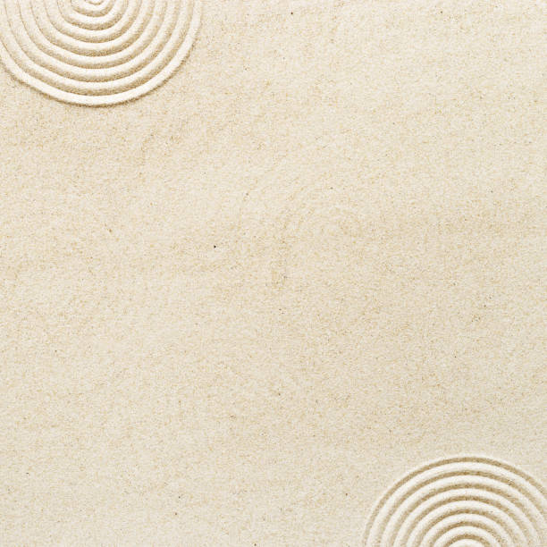 istock Circle lines on sand, beautiful sandy texture. Natural sand background for spa wellness, concept for relaxation balance and harmony. Concentration and spirituality in Japanese zen garden 1403863668