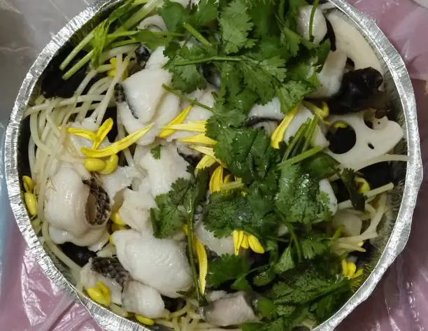 Photo of Sichuan boiled fish with pickled cabbage and chili