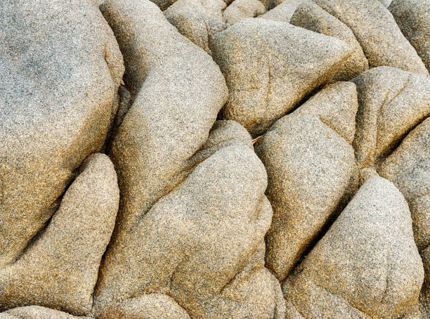 Granite beach boulders have been carved into unique shapes by the wind and water on Corsica.