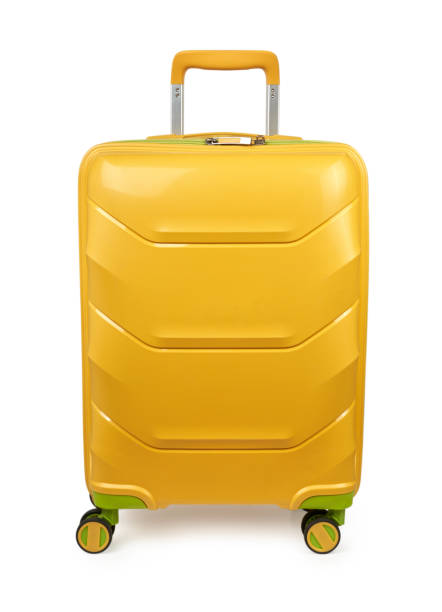 Yellow suitcase isolated on white background stock photo